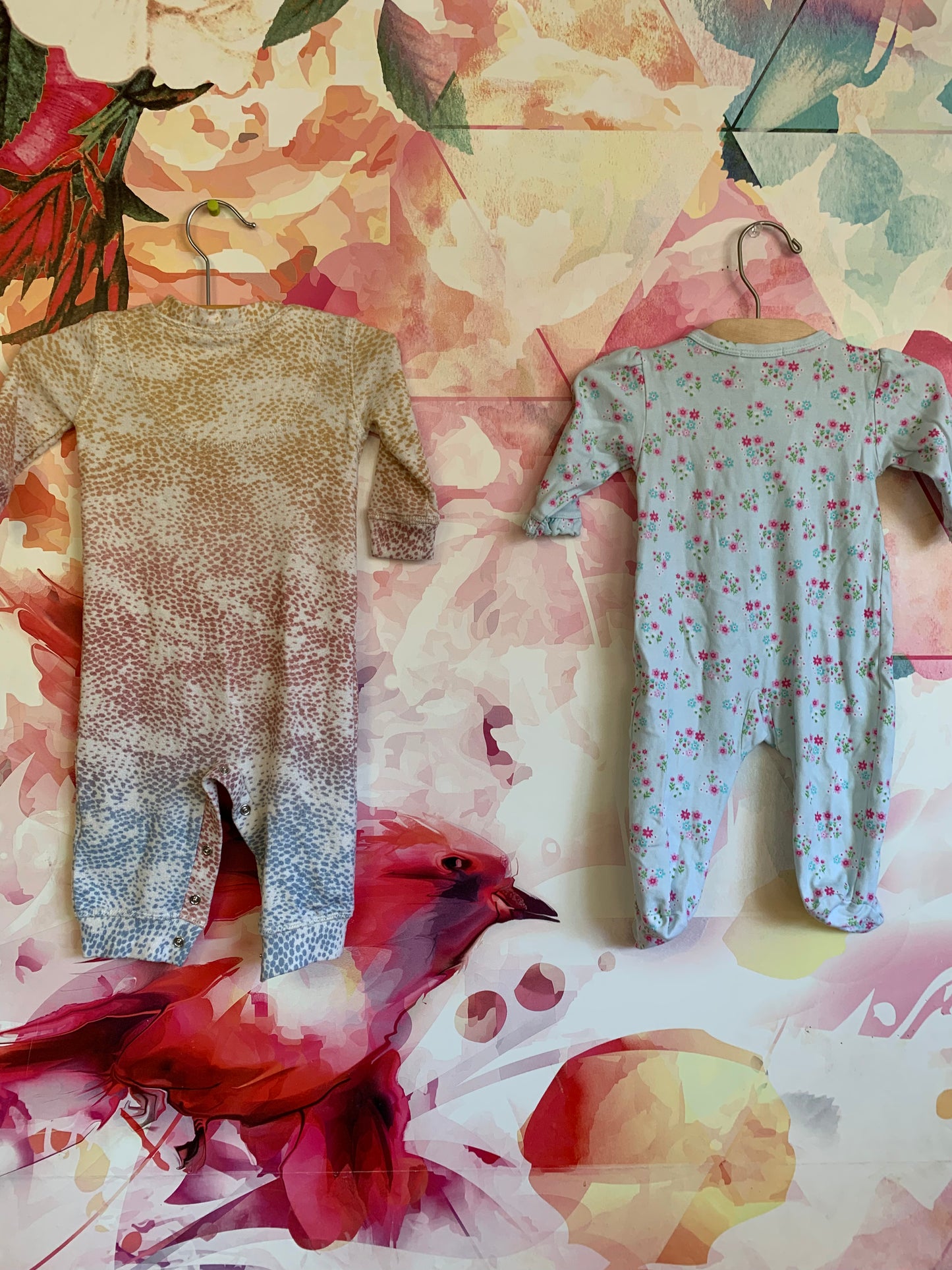 Bundle! Kissy Kissy long sleeve zip up light blue romper with pink and green flowers. P.J. Salvage ombré dotted snap romper. Both size 3-6m