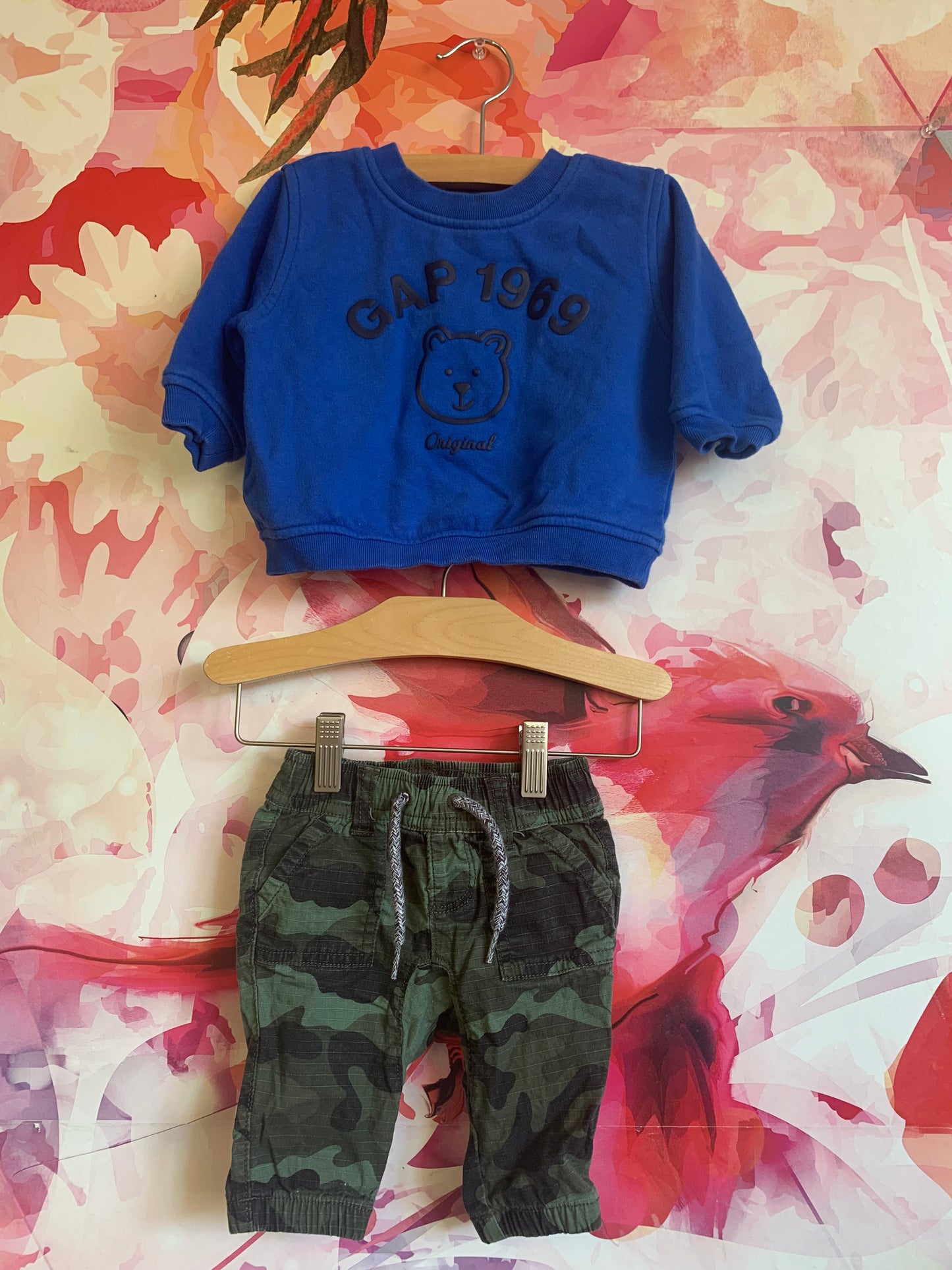 Gap 1969 blue sweatshirt and green/black camouflage pants. Size 0-3m