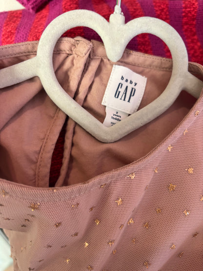 Baby Gap pink tulle short sleeve dress with hold stars. Size 2T.