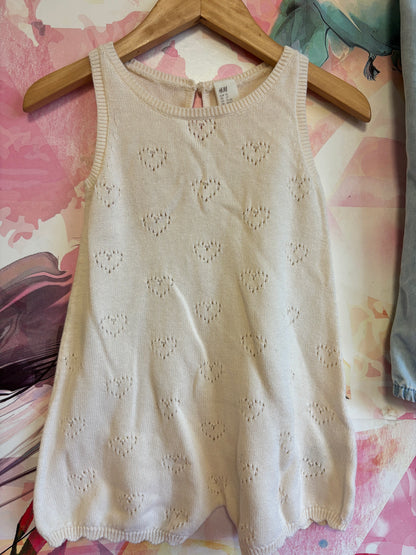 2 H&M rompers. Cream knit sleeveless with hearts and scalloped hem. Light blue denim adjustable overalls. Both size 2T