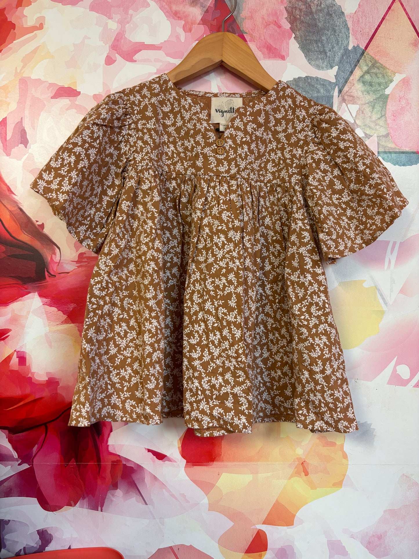 Vignette beige short sleeve top with white flowers. Size 5T. NEW WITH TAGS